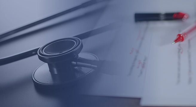 Graphic: stethoscope and contract with red ink